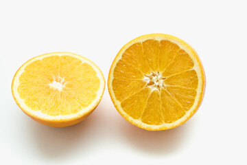 orange on a white background, slices of orange, oranges in circles, cut orange