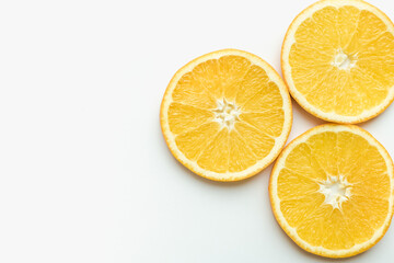 Fototapeta na wymiar orange on a white background, slices of orange, oranges in circles, cut orange