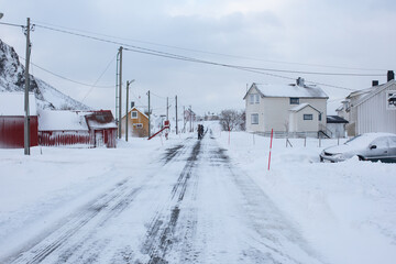 Fototapeta na wymiar A remote arctic village during a snow storm. 