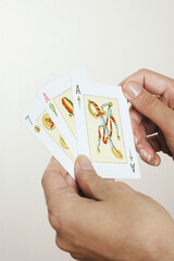 Hand with Cards on white background