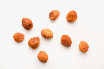 dried apricots on a white background, apricot on a white background, dried fruits