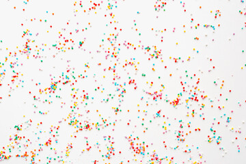 Easter cake sprinkle, color background, colored sprinkles