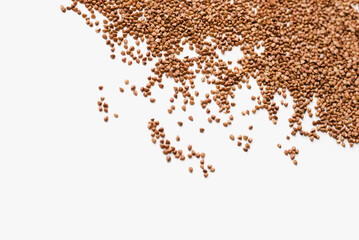 Fototapeta premium buckwheat groats on a white background, a bunch of buckwheat