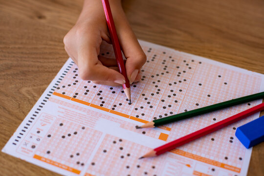 Multiple choice exam. Optical exam form with pen and eraser. 
