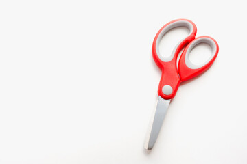 scissors with red handle, stationery scissors on a white background