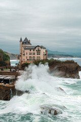 Biarritz, France, Bay of Biscay, the rocky Basque coast of Atlantic ocean in dramatic sunset light