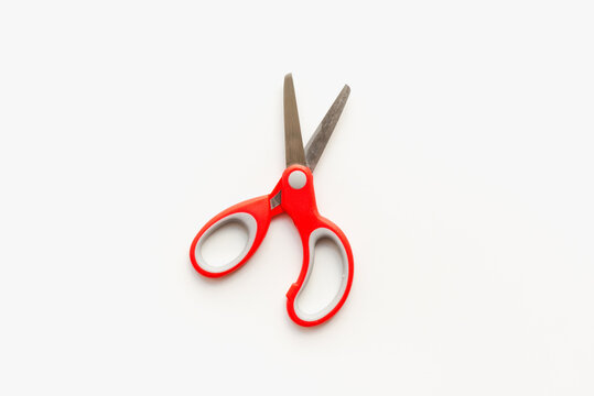 stationery scissors, scissors with red handle, stationery scissors on a white background
