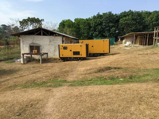Africa, Liberia, Monrovia, Houses for expatriate workers with generators near it. Typical local...