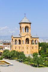 Fototapeta na wymiar It's Bell tower of the Holy Trinity Cathedral of Tbilisi, the ma