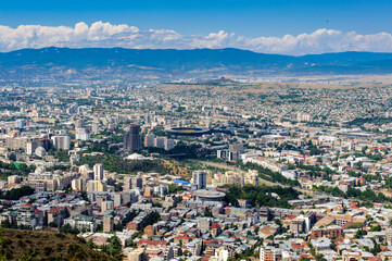 Fototapeta na wymiar It's Panoramic view of Tbilisi, Georgia. Tbilisi is the capital and the largest city of Geogia with 1,5 mln people population