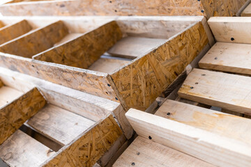 Empty wooden shelves for products in the store that went bust during the pandemic. The shelves are made of recycled sawdust. High quality photo