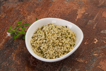 Peeled hemp seeds in the bowl