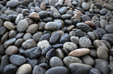 Fototapeta na wymiar small stones, sea pebbles, texture and background