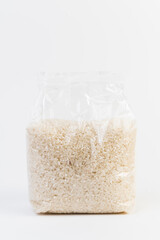 Packing rice porridge. Rice in casseroles on a white background.