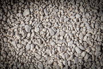 Stone gravel at a construction site as a background.