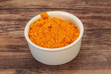 Tumeric powder in the bowl
