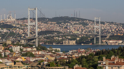 Istanbul, Turkey - completed in 1973 and one of the main landmarks in Istanbul, the 15 July Martyrs Bridge connects Europe and Asia. Here in particular the suspension bridge structure