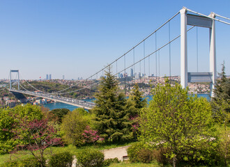 Istanbul, Turkey - completed in 1988 and one of the main landmarks in Istanbul, the Fatih Sultan Mehmet Bridge connects Europe and Asia. Here in particular the bridge seen from Fatih Korusu park