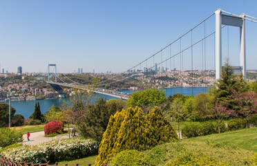 Istanbul, Turkey - completed in 1988 and one of the main landmarks in Istanbul, the Fatih Sultan Mehmet Bridge connects Europe and Asia. Here in particular the bridge seen from Fatih Korusu park