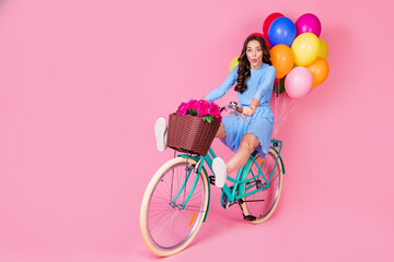 Full length body size view of attractive cheerful cheery wavy-haired lady riding bike without legs...