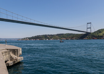 Istanbul, Turkey - completed in 1988 and one of the main landmarks in Istanbul, the Fatih Sultan Mehmet Bridge connects Europe and Asia. Here in particular the suspension bridge structure