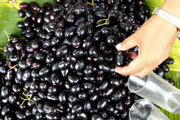 Fresh Duhat or Java plum sold at a sidewalk