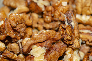 Peeled walnuts close-up. Surface texture. Healthy diet.