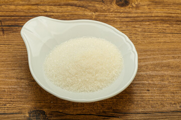 White sugar in the bowl