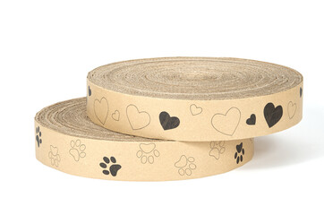 Two paper cat scratchers with paws and hearts from recyclable cardboard isolated on white background