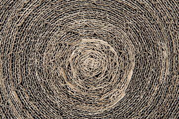 Paper cat scratcher background from recyclable cardboard