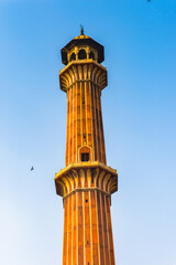 Fototapeta na wymiar It's Minaret of the Jama Masjid, Old town of Delhi, India. It is the principal mosque in Delhi