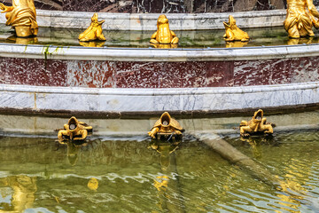 Fragment of Latona Fountain in Versailles palace - royal chateau, 20 km southwest of Paris....