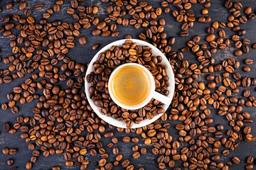 Cup of coffee espresso. Hot drink coffee on dark background