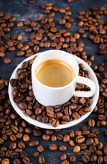 Cup of coffee espresso. Hot drink coffee on dark background