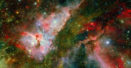 Fototapeta premium Starry outer space. Background texture. Elements of this image furnished by NASA