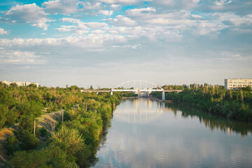 Fototapeta premium Peaceful panorama of the Russian city of Volgograd from the bridge, view of the mountains, high