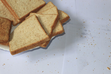 Close up image of cut of loaf bread on white white background