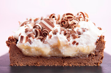 duo chocolate twirl on a chocolate tart, brown and white