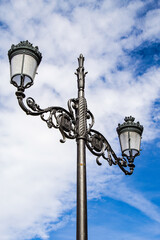 Fototapeta na wymiar It's Lamp post near the Royal Palace, Madrid, Spain