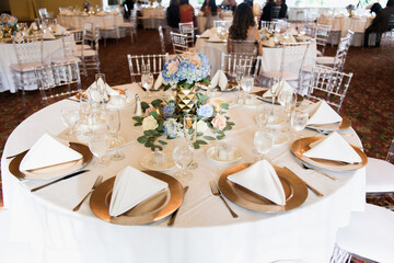 White flowers decorations during outdoor wedding ceremony