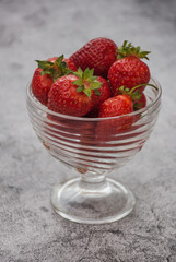 glass vase with strawberries