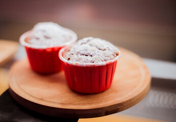 Two Cakes with cream and sugar, in cafe top view.