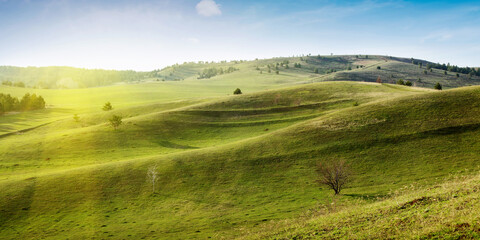 Fototapeta na wymiar landscape with green hills and blue sky.