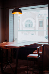 Cafeteria interior,wooden table and chairs