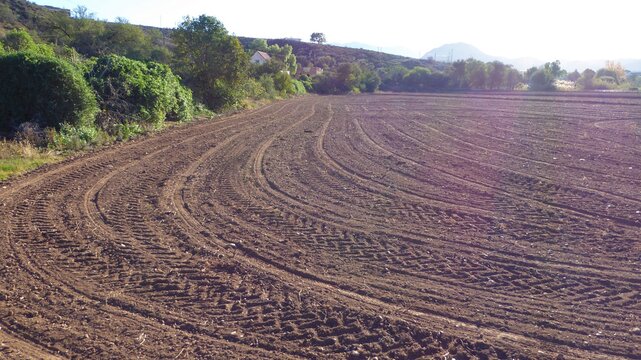Tractor Tracks and Grooves in a Freshly Tilled Field of Dark Soil, Little Karoo South Africa