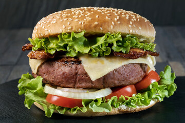 A classic big hamburger with crispy bacon