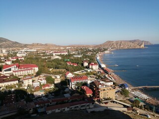 view of the city of the sea and mountains