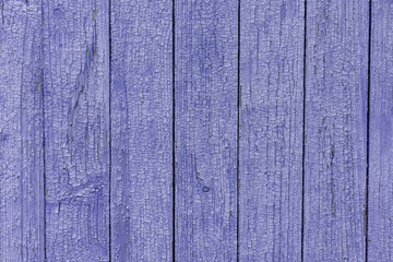 wooden retro background. dilapidated boards painted with faded purple paint