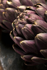 Macro close up of raw artichokes.