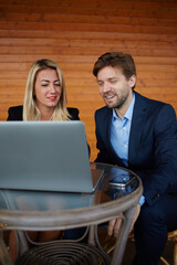 Group of successful business people having meeting together, two business colleagues working with...